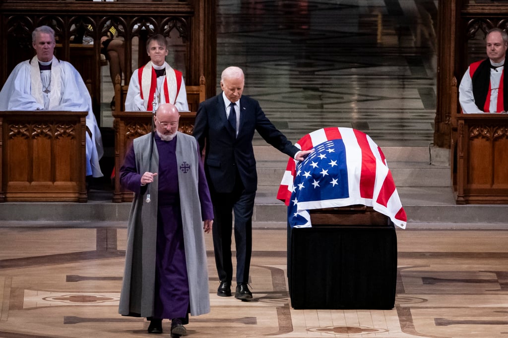 US President Joe Biden touches the casket of former president Jimmy Carter. Photo: The New York Times via AP US President Joe Biden touches the casket of former president Jimmy Carter. Photo: The New York Times via AP