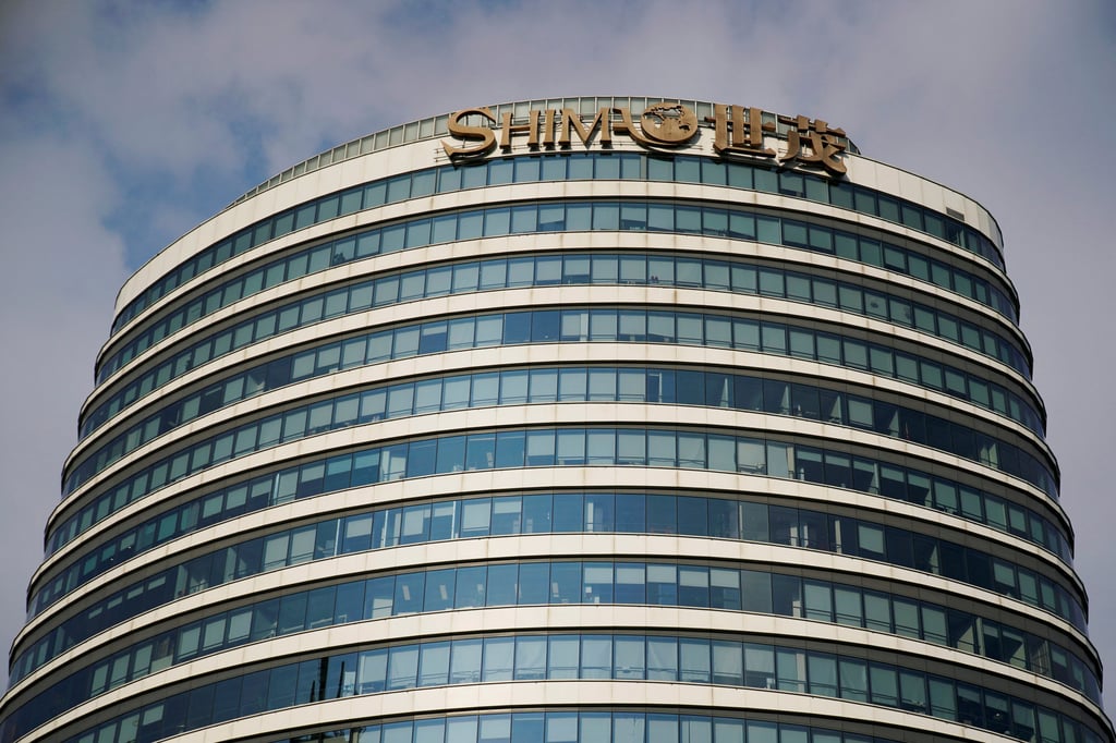 The logo of property developer Shimao is seen on a building in Shanghai, China, on January 13, 2022. Photo: Reuters The logo of property developer Shimao is seen on a building in Shanghai, China, on January 13, 2022. Photo: Reuters