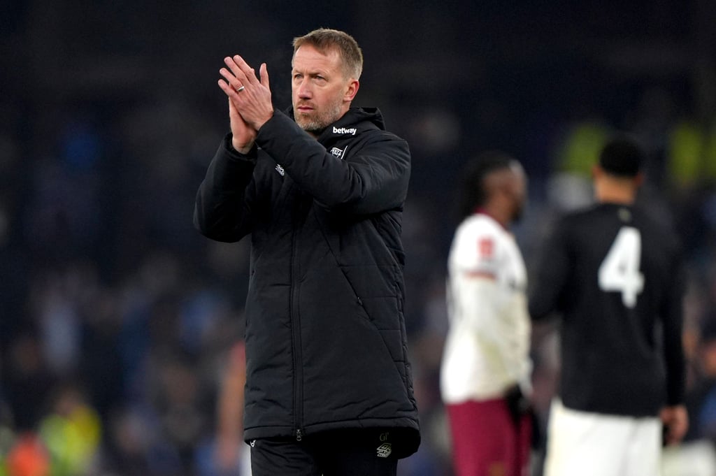 Graham Potter applauds the fans after suffering FA Cup elimination on his debut as West Ham boss. Photo: AP