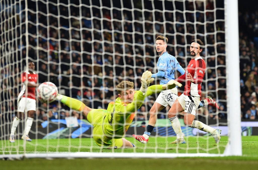 James McAtee scored a second-half hat-trick for Manchester City as they cruised past Salford City in the third round of the FA Cup. Photo: Reuters James McAtee scored a second-half hat-trick for Manchester City as they cruised past Salford City in the third round of the FA Cup. Photo: Reuters