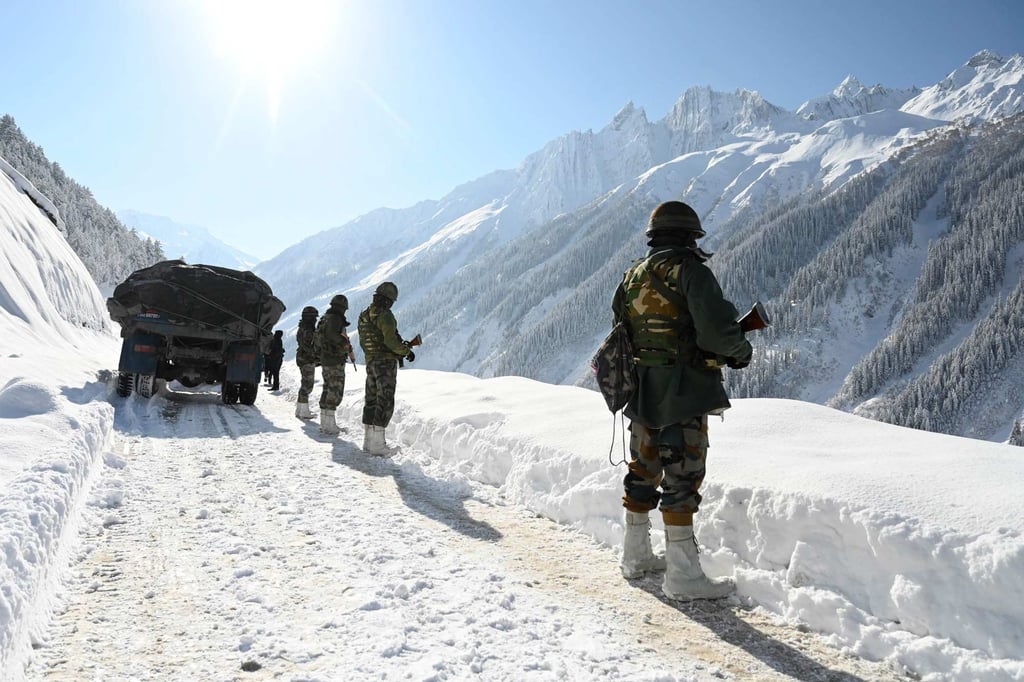 Indian army soldiers walk along a road near Zojila mountain pass that connects Srinagar to the union territory of Ladakh, bordering China, on February 28, 2021. File photo: AFP Indian army soldiers walk along a road near Zojila mountain pass that connects Srinagar to the union territory of Ladakh, bordering China, on February 28, 2021. File photo: AFP