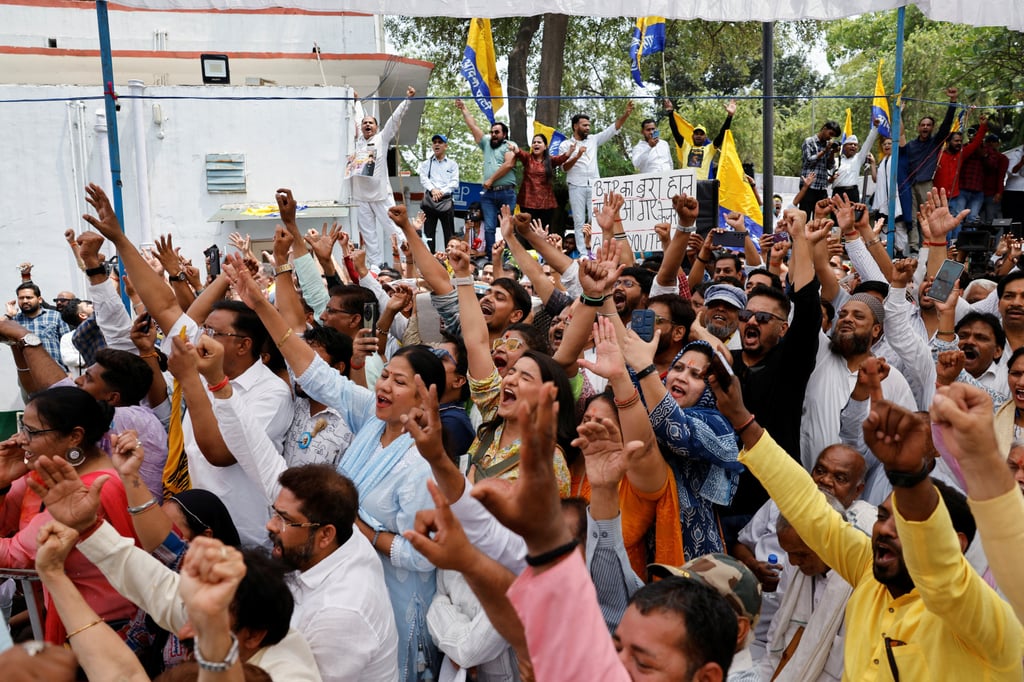 Supporters cheer during a press conference by Delhi Chief Minister Arvind Kejriwal on May 11 after the Supreme Court granted him temporary bail in a liquor policy corruption case. Photo: Reuters Supporters cheer during a press conference by Delhi Chief Minister Arvind Kejriwal on May 11 after the Supreme Court granted him temporary bail in a liquor policy corruption case. Photo: Reuters