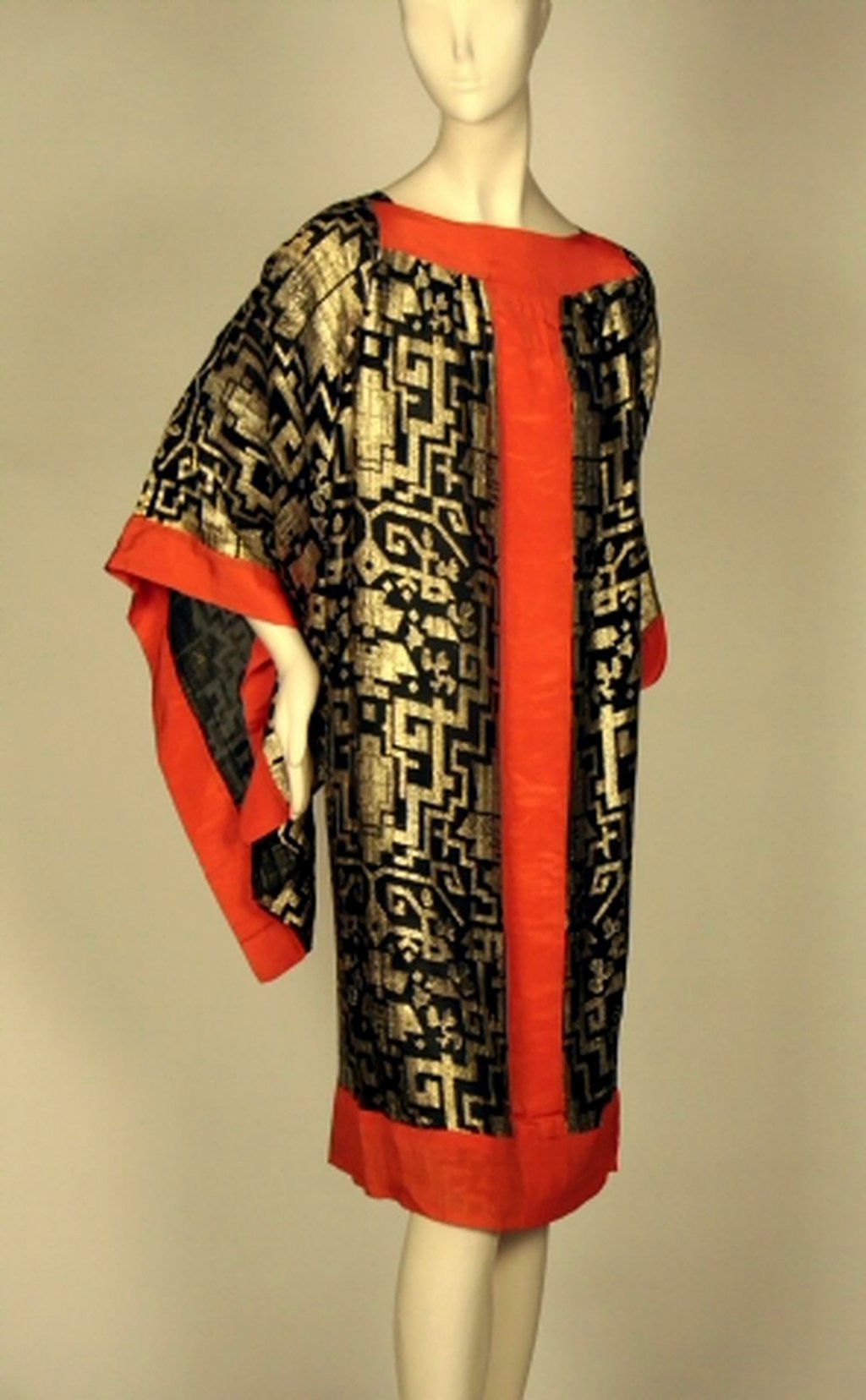 A 1920s dress made of black silk chiffon with brocaded gold geometric motifs and red silk crepe on show at the Museum of the City of New York. Photo: AP A 1920s dress made of black silk chiffon with brocaded gold geometric motifs and red silk crepe on show at the Museum of the City of New York. Photo: AP