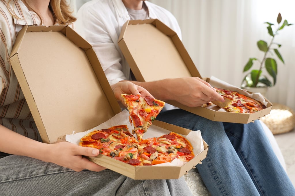 Is a pizza worth the 7.8 minutes it could shave off your life? Photo: Shutterstock Is a pizza worth the 7.8 minutes it could shave off your life? Photo: Shutterstock