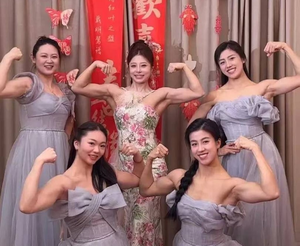 Marriage muscle: The super-fit bride, centre, and her bridesmaids show their strength. Photo: Weibo