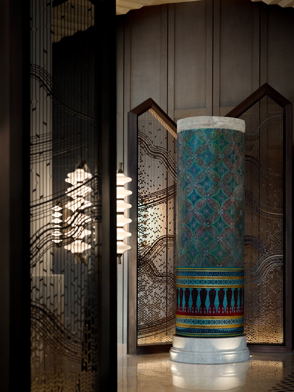 A hand-painted pillar in the lobby of the new Dusit Thani Bangkok is a remnant from the original structure. Photo: Handout A hand-painted pillar in the lobby of the new Dusit Thani Bangkok is a remnant from the original structure. Photo: Handout
