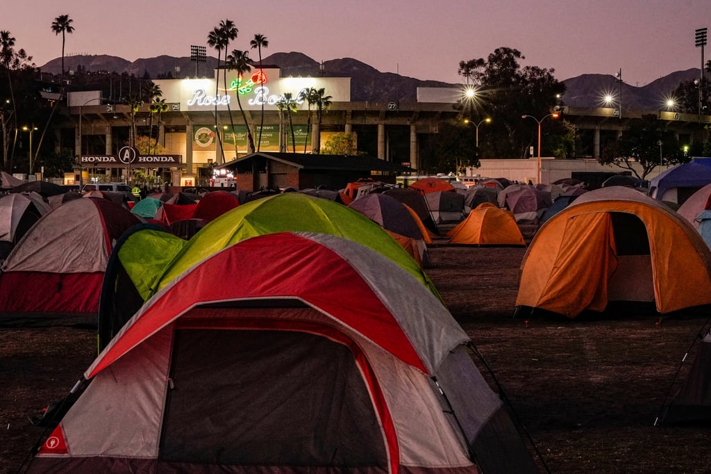 Hundreds of visiting firefighters and emergency workers are staying outside the Rose Bowl football stadium. Photo: AP