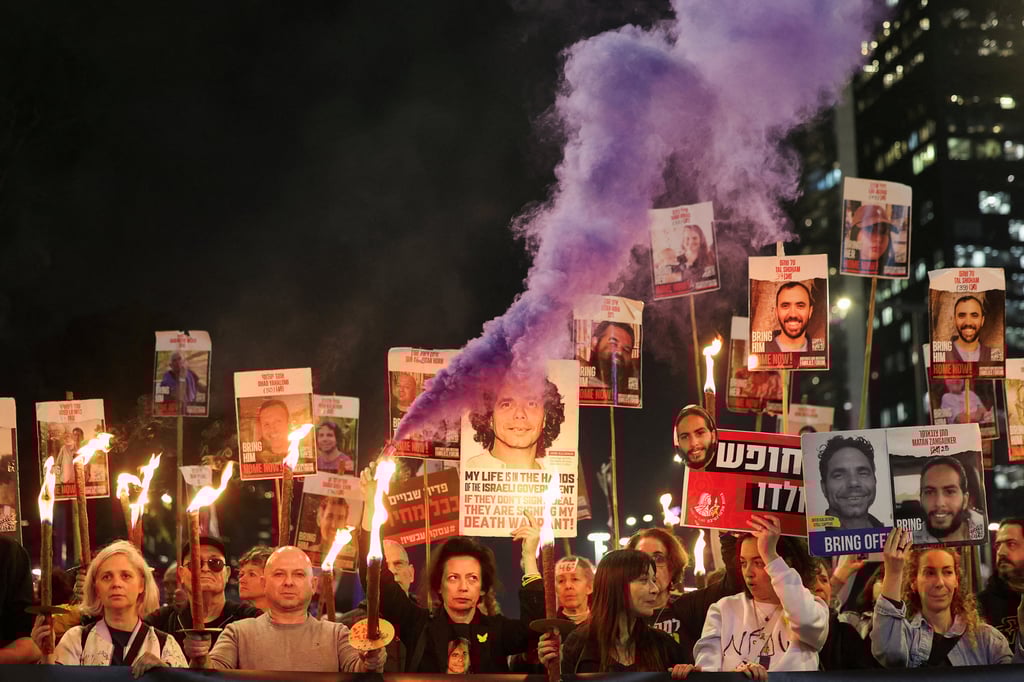 Supporters of Gaza hostages, in Tel Aviv, Israel. Photo: Reuters Supporters of Gaza hostages, in Tel Aviv, Israel. Photo: Reuters
