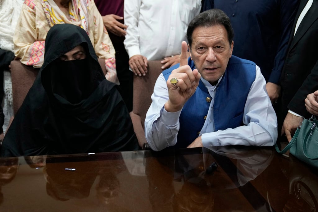 Pakistan’s former PM Imran Khan and his wife Bushra Bibi at an office of Lahore High Court in Lahore in 2023. Photo: AP Pakistan’s former PM Imran Khan and his wife Bushra Bibi at an office of Lahore High Court in Lahore in 2023. Photo: AP