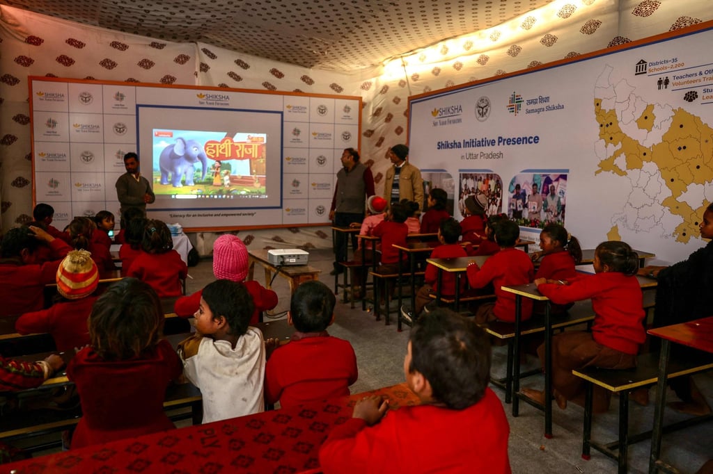 Children participate in a smart class at a makeshift school in Prayagraj, India, on January 11. Photo: AFP