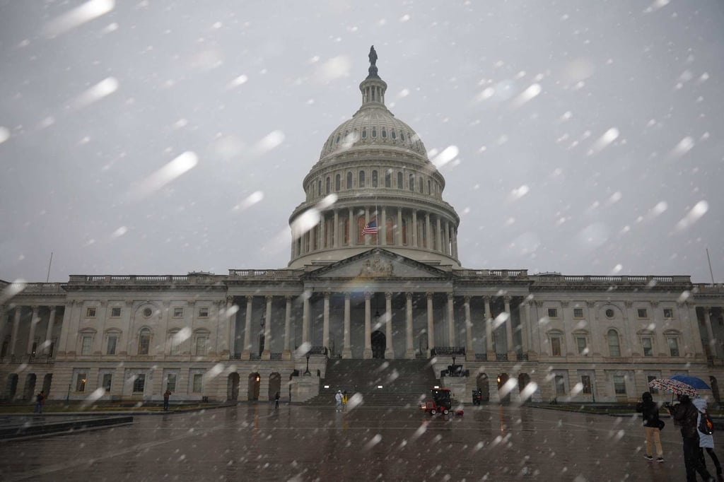 Snow falls over the US Capitol building in Washington. Photo: AFP Snow falls over the US Capitol building in Washington. Photo: AFP