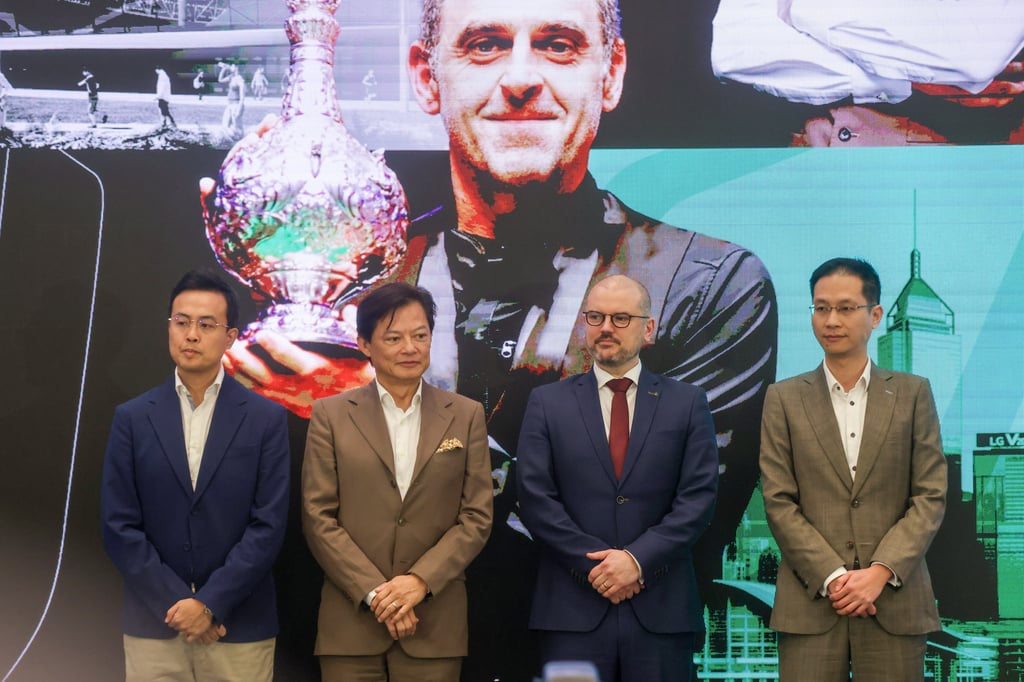 Marco Fu (far left) and WST’s Simon Brownell (third from left) in Hong Kong on Tuesday. Photo: Jonathan Wong Marco Fu (far left) and WST’s Simon Brownell (third from left) in Hong Kong on Tuesday. Photo: Jonathan Wong