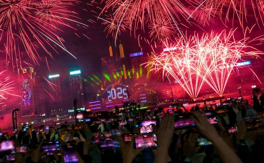 Hundreds of thousands of revellers packed both sides of Victoria Harbour for a fireworks display on New Year’s Eve. Photo: Sun Yeung