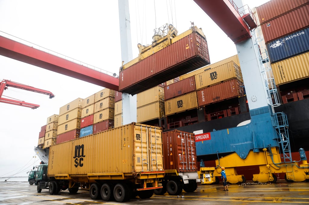 A worker looks at a container being loaded onto a ship at the Tanjung Priok port in Jakarta on January 14. Indonesia recorded a US$16.8 billion trade surplus with the US last year. Photo: EPA-EFE A worker looks at a container being loaded onto a ship at the Tanjung Priok port in Jakarta on January 14. Indonesia recorded a US$16.8 billion trade surplus with the US last year. Photo: EPA-EFE