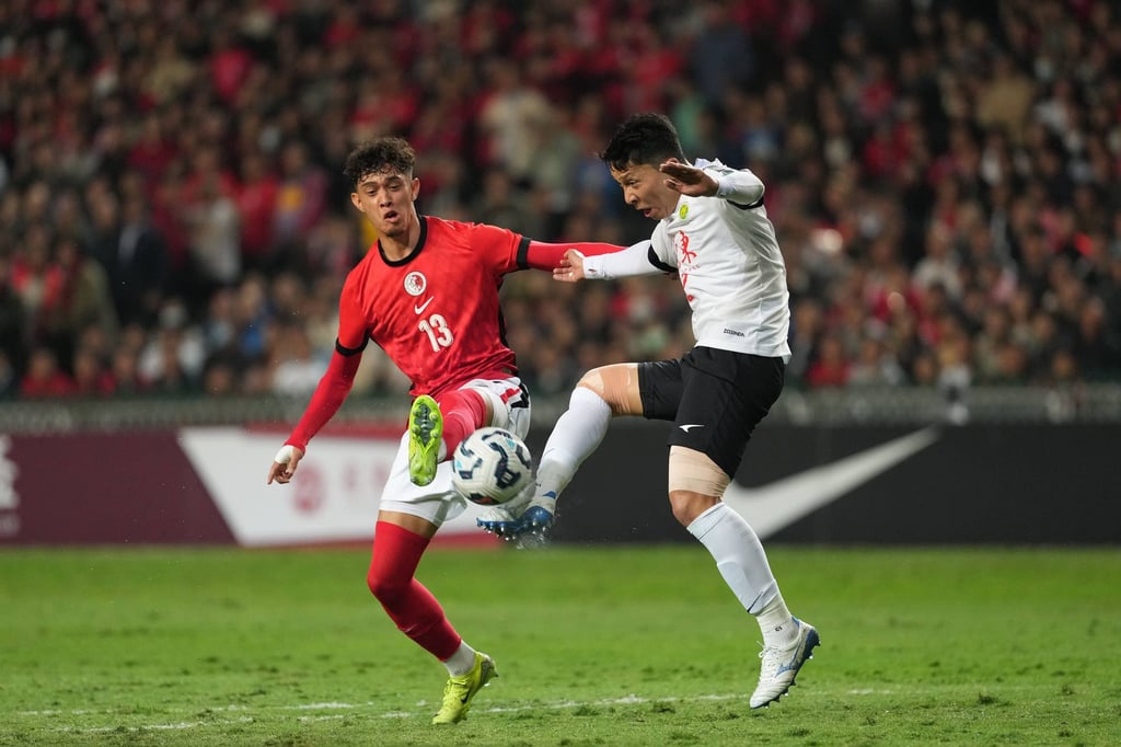 Hong Kong’s Raphael Merkies (left) challenges for the ball at Hong Kong Stadium. Photo: Elson Li Hong Kong’s Raphael Merkies (left) challenges for the ball at Hong Kong Stadium. Photo: Elson Li
