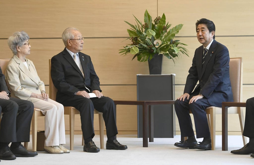 Japan’s then prime minister Shinzo Abe meets Sakie Yokota (left), whose daughter Megumi was abducted by North Korea in 1977, in 2018. Photo: Kyodo Japan’s then prime minister Shinzo Abe meets Sakie Yokota (left), whose daughter Megumi was abducted by North Korea in 1977, in 2018. Photo: Kyodo