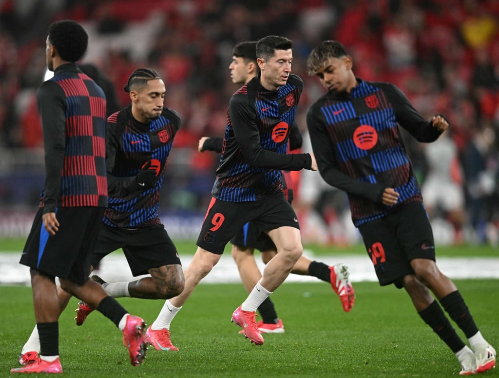 Barcelona stars including Lamine Yamal (far right) warm up before facing Benfica on Tuesday. Photo: AFP Barcelona stars including Lamine Yamal (far right) warm up before facing Benfica on Tuesday. Photo: AFP