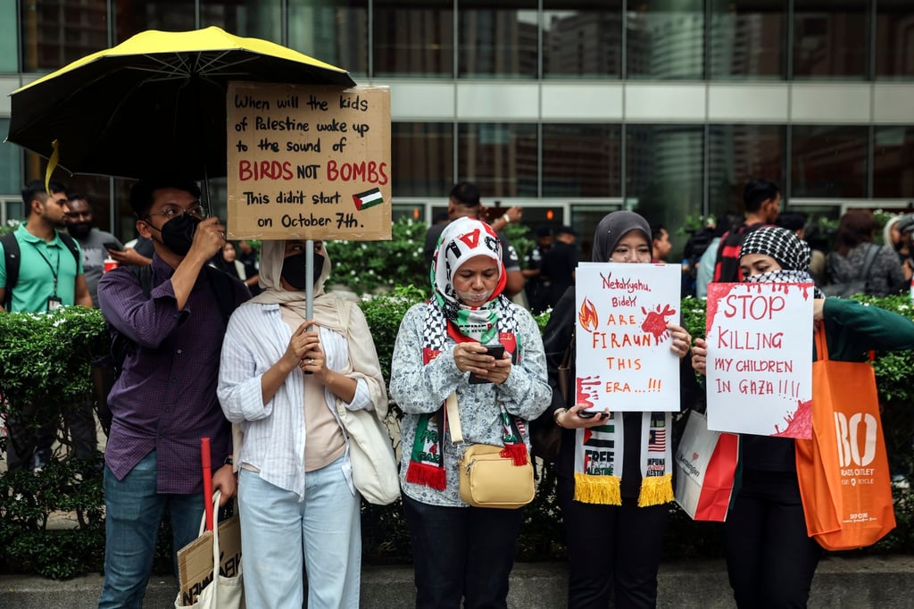 Malaysians take part in a silent protest in Kuala Lumpur in solidarity with the Palestinian people in June last year. Photo: EPA-EFE Malaysians take part in a silent protest in Kuala Lumpur in solidarity with the Palestinian people in June last year. Photo: EPA-EFE