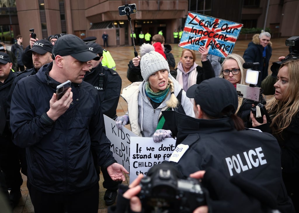 Protesters and police outside Liverpool Crown Court. Photo: EPA-EFE