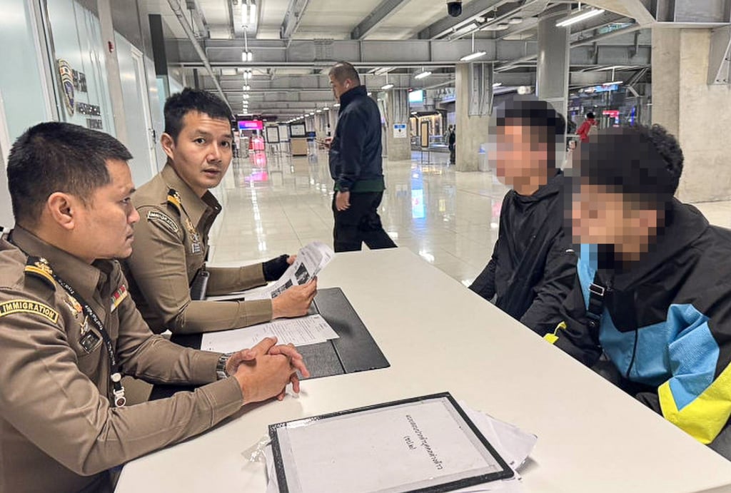 Thai police question two suspects upon their arrival in the country. Photo: Handout