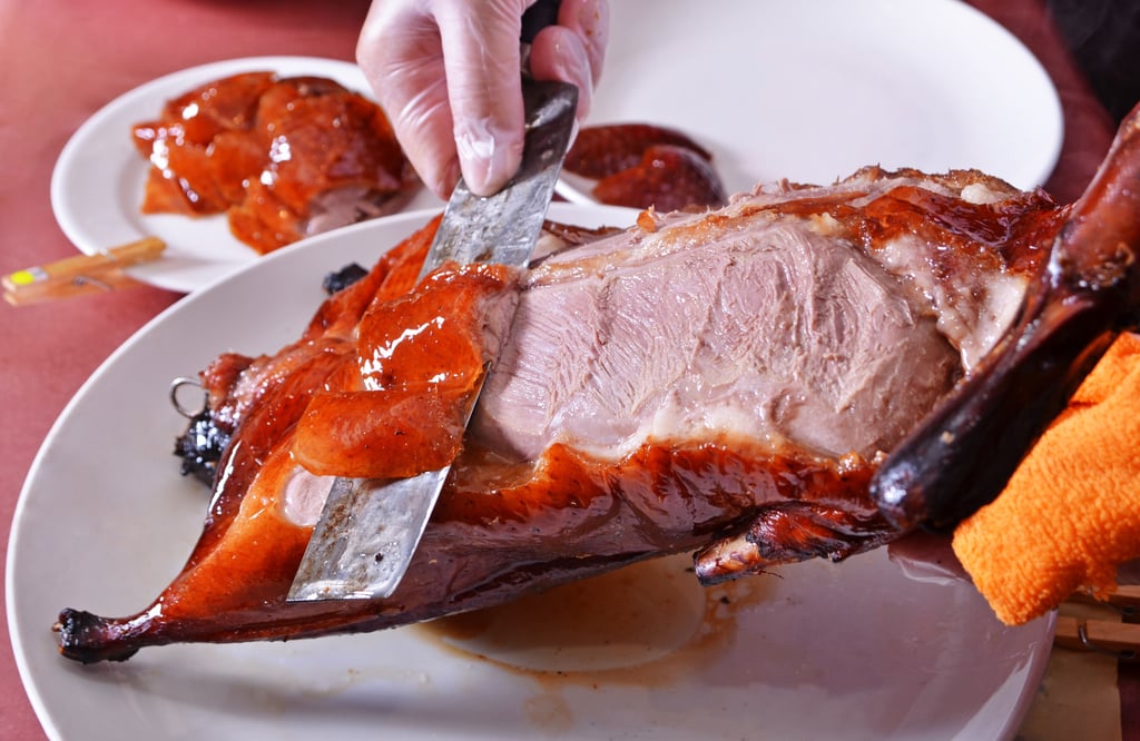 The signature Beijing dish, Peking roast duck, is a firm favourite far and wide. Photo: Shutterstock The signature Beijing dish, Peking roast duck, is a firm favourite far and wide. Photo: Shutterstock