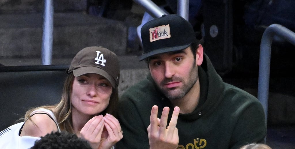 Olivia Wilde (left) and Dane DiLiegro attend a basketball game. Photo: Getty Images Olivia Wilde (left) and Dane DiLiegro attend a basketball game. Photo: Getty Images