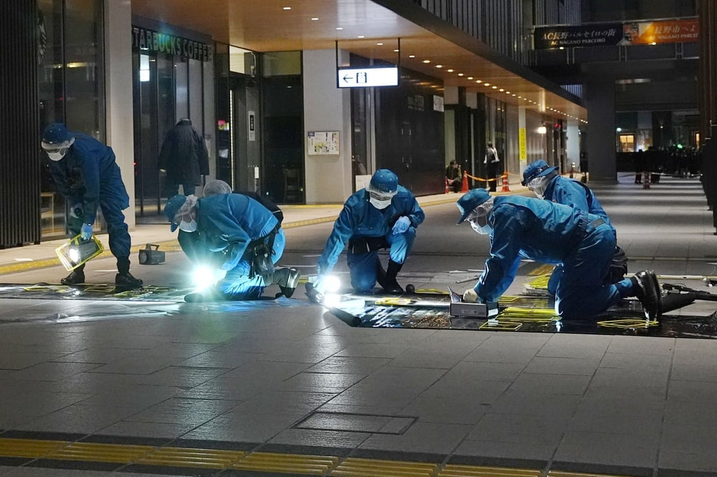 Police officers investigate the site of an apparent random stabbing near JR Nagano Station in the central Japan city of Nagano. Photo: Kyodo Police officers investigate the site of an apparent random stabbing near JR Nagano Station in the central Japan city of Nagano. Photo: Kyodo