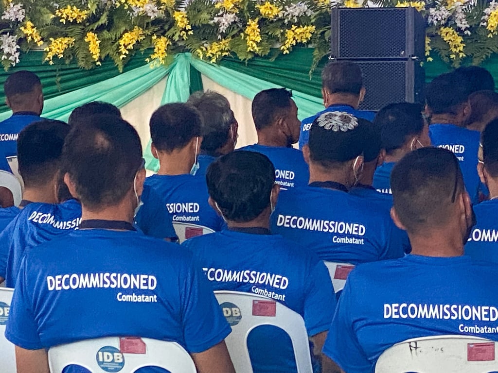Former MILF rebels attend a decommissioning ceremony in the town of Sultan Kudarat, Maguindanao in 2022. Photo: Jeoffrey Maitem