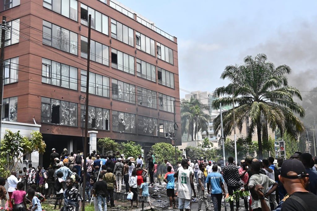 People attack the Rwanda Embassy in Kinshasa, Democratic Republic of the Congo. Photo: AP
