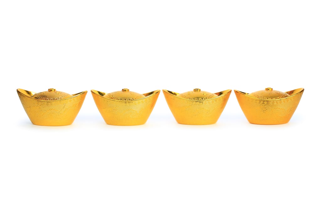 Gold ingot decorations are common at Lunar New Year and are believed to bring good luck if placed in the right location. Photo: Shutterstock Gold ingot decorations are common at Lunar New Year and are believed to bring good luck if placed in the right location. Photo: Shutterstock