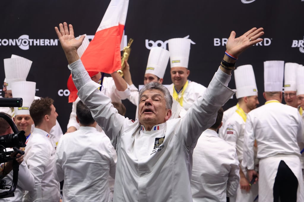 Régis Marcon, father of Paul Marcon, celebrates after his son wins first prize at the Bocuse d’Or 2025. Photo: EPA-EFE