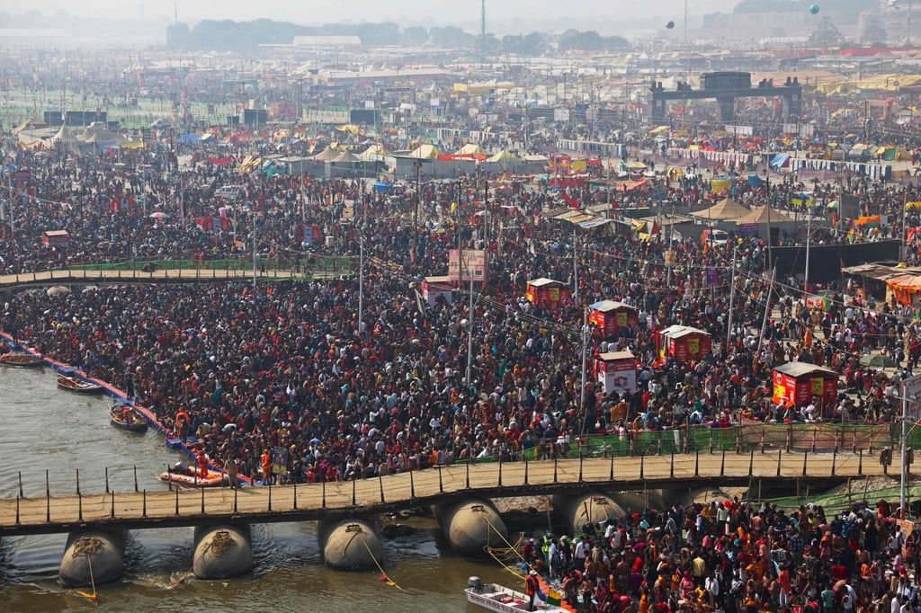 Pilgrims gather to take a holy dip on Wednesday. Photo: AFP Pilgrims gather to take a holy dip on Wednesday. Photo: AFP