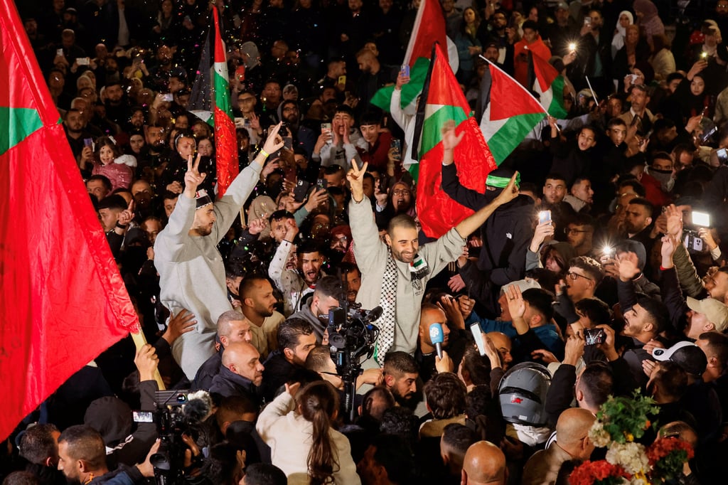Palestinian prisoners react in Ramallah on Thursday after being released from an Israeli jail as part of a ceasefire deal in Gaza. Photo: Reuters
