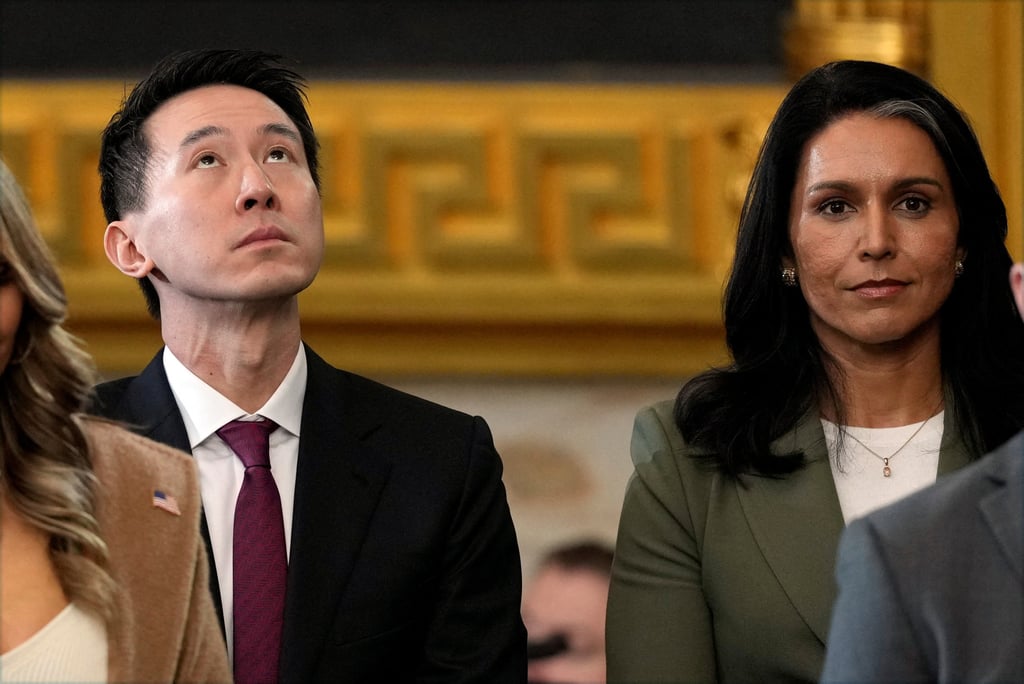 TikTok CEO Chew Shou Zi stands with Tulsi Gabbard, the nominee to be the next director of national intelligence, during the 60th Presidential Inauguration in the Rotunda of the US Capitol in Washington on January 20. Photo: Reuters