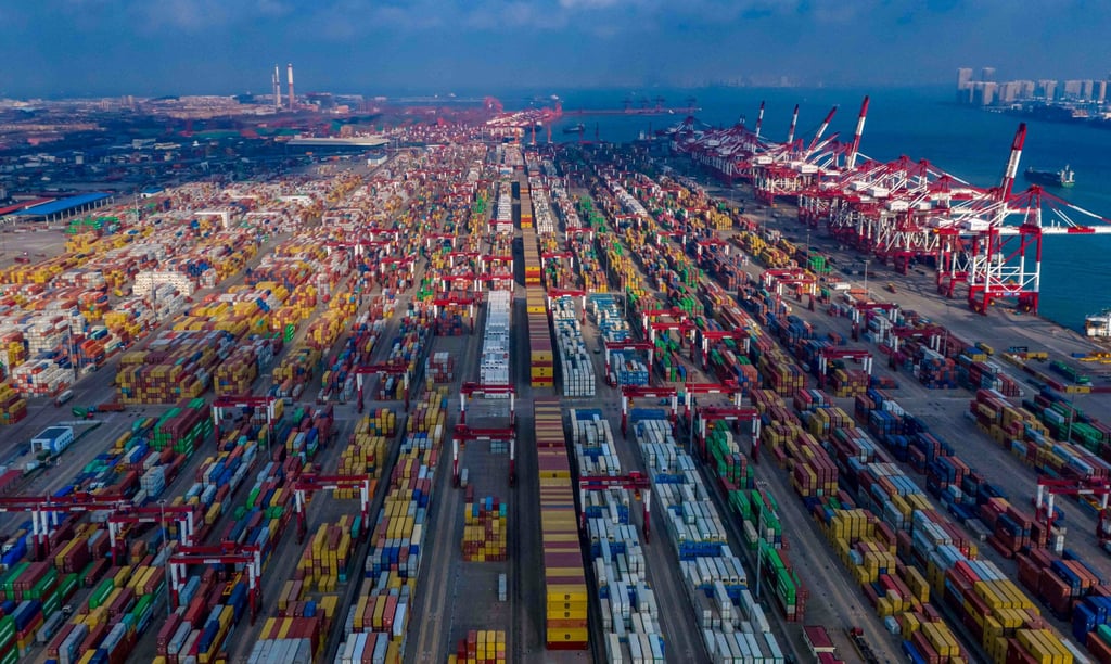 Ships are loaded at the container terminal of the port in Qingdao, in China’s eastern Shandong province on January 25, 2025. Photo: AFP