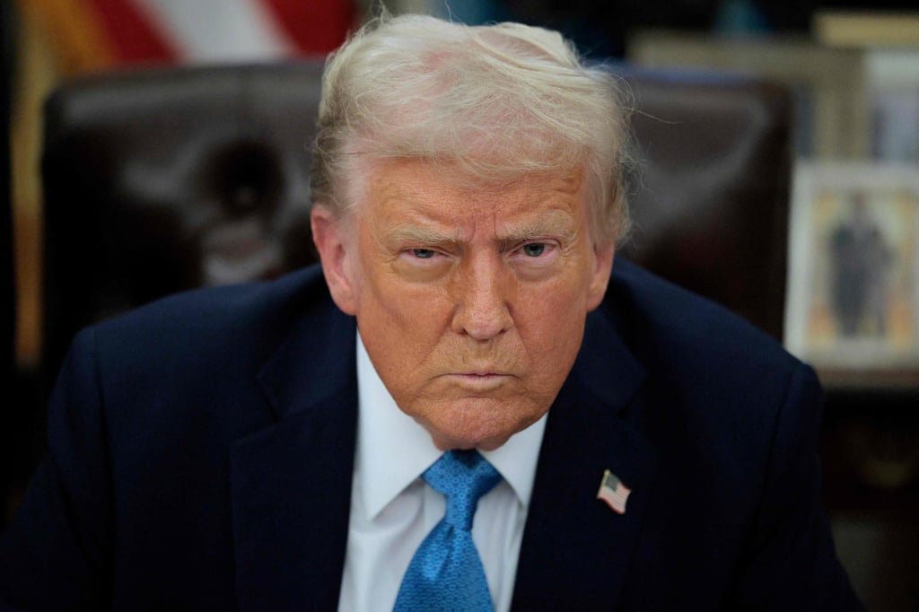 US President Donald Trump talks to reporters about tariffs against China, Canada and Mexico on Friday. Photo: Getty Images via AFP US President Donald Trump talks to reporters about tariffs against China, Canada and Mexico on Friday. Photo: Getty Images via AFP