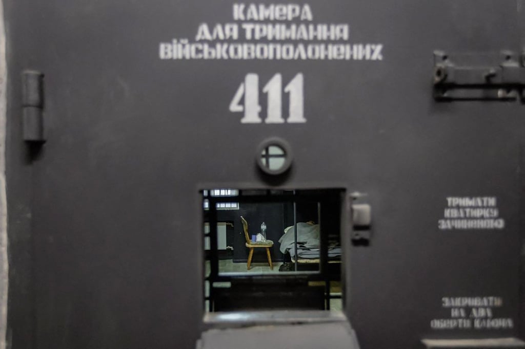 A suspected North Korean prisoner of war lies in a cell at an undisclosed location in Ukraine last month. Photo: Ukrainian Presidential Press Service/AFP