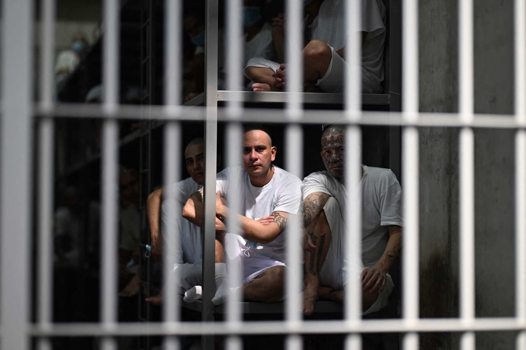 Inmates look out from a cell at the CECOT mega-prison in El Salvador last month. Photo: AFP Inmates look out from a cell at the CECOT mega-prison in El Salvador last month. Photo: AFP