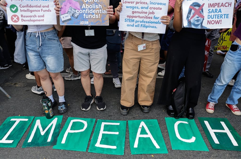 Protesters call for the impeachment of Vice-President Sara Duterte outside the Congress House of Representatives in Manila’s Quezon City on Wednesday. Photo: EPA-EFE