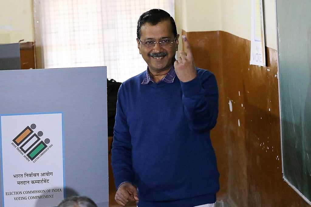 Aam Aadmi Party chief Arvind Kejriwal shows his inked finger after casting his vote at a polling station in New Delhi, India, on Wednesday. Photo: EPA-EFE Aam Aadmi Party chief Arvind Kejriwal shows his inked finger after casting his vote at a polling station in New Delhi, India, on Wednesday. Photo: EPA-EFE