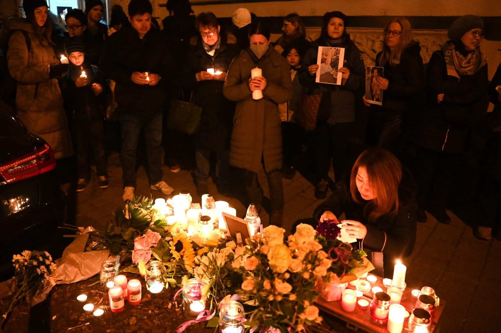 People attend a vigil in central Budapest, Hungary on February 4 to commemorate a 43-year-old Japanese woman. Photo: AFP People attend a vigil in central Budapest, Hungary on February 4 to commemorate a 43-year-old Japanese woman. Photo: AFP