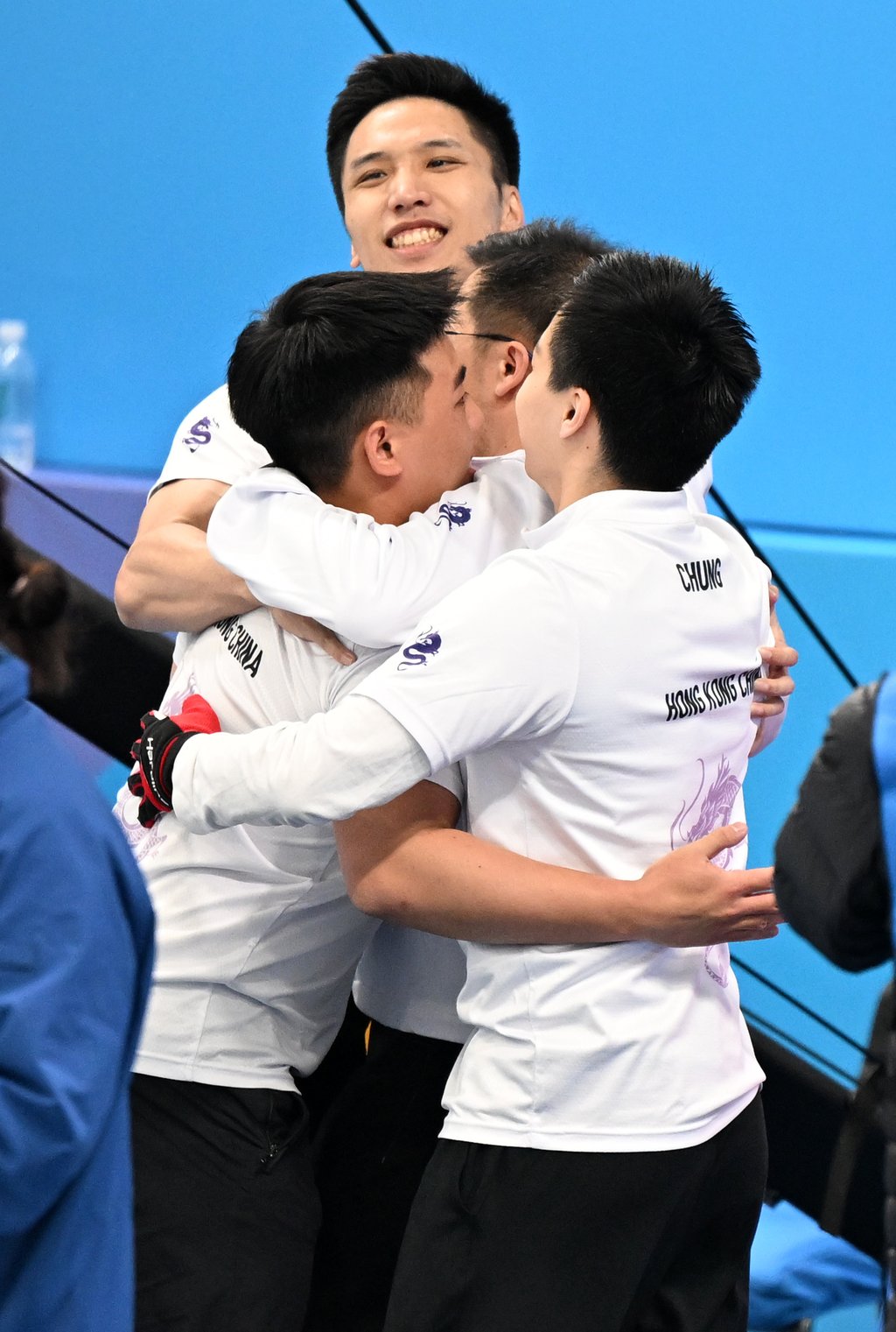Martin Yan (top) celebrates with Hong Kong teammates after the qualifying win over Kazakhstan. Photo: Xinhua Martin Yan (top) celebrates with Hong Kong teammates after the qualifying win over Kazakhstan. Photo: Xinhua