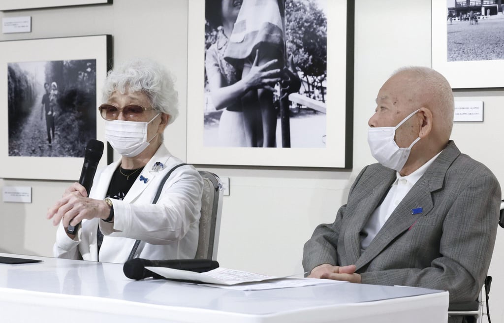Akihiro Arimoto, right whose daughter Keiko was taken to North Korea in 1983 at age 23, and Sakie Yokota, 89, whose daughter Megumi was abducted by North Korea in 1977 at age 13, attend a meeting in Tokyo in 2023. Photo: Kyodo