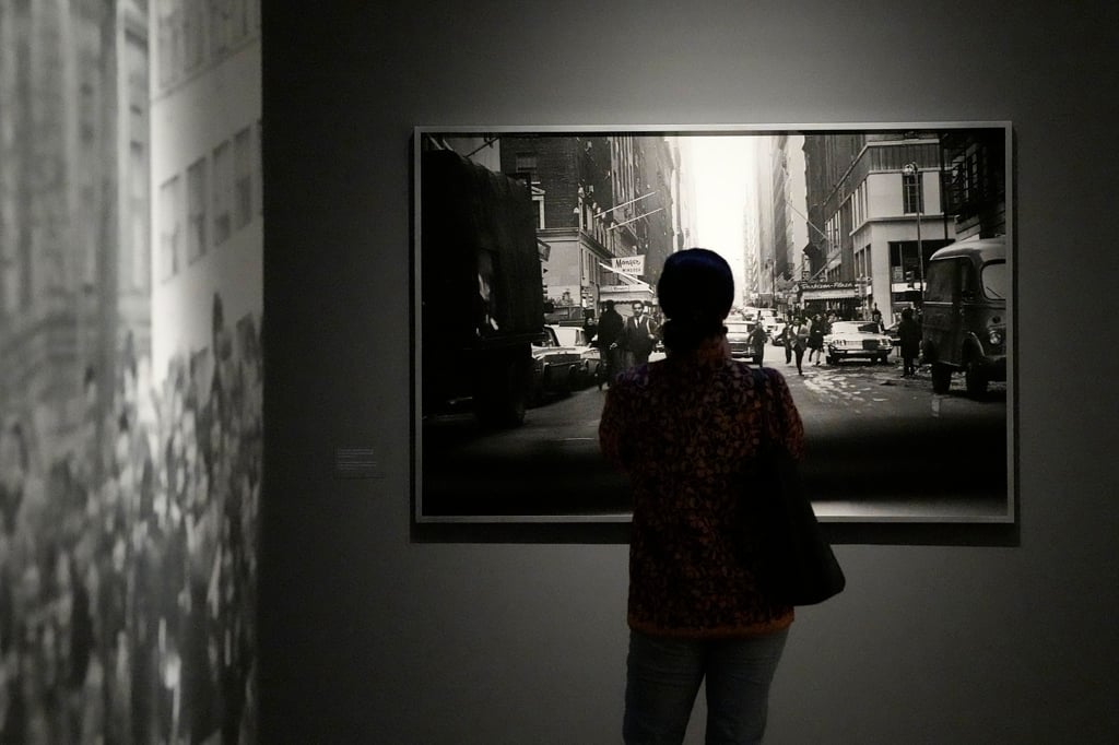 A visitor looks at pictures during a preview of “Paul McCartney Photographs 1963-64: Eyes of the Storm” exhibition at the National Portrait Gallery, in London, Britain, in 2023. Photo: AP