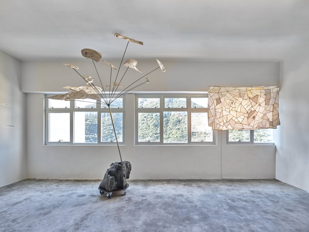 Somersault Cloud (2022), left, incorporates materials recycled from Lam’s past works. Starry Day (2015/2022), right, was originally stretched on a canvas in previous exhibitions. Photo: courtesy of Axel Vervoordt Gallery