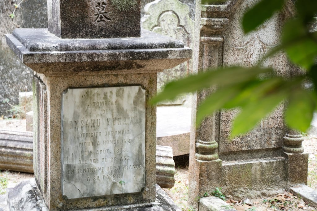 The grave of Yukawa Onsaku is the oldest identifiable Japanese grave in the Hong Kong Cemetery. Photo: Alexander Mak The grave of Yukawa Onsaku is the oldest identifiable Japanese grave in the Hong Kong Cemetery. Photo: Alexander Mak