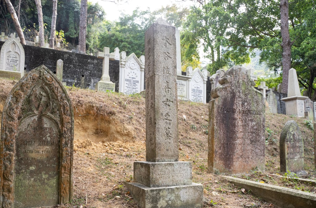 The grave of Saki Kiya (obelisk) in the Hong Kong Cemetery. Photo: Alexander Mak The grave of Saki Kiya (obelisk) in the Hong Kong Cemetery. Photo: Alexander Mak