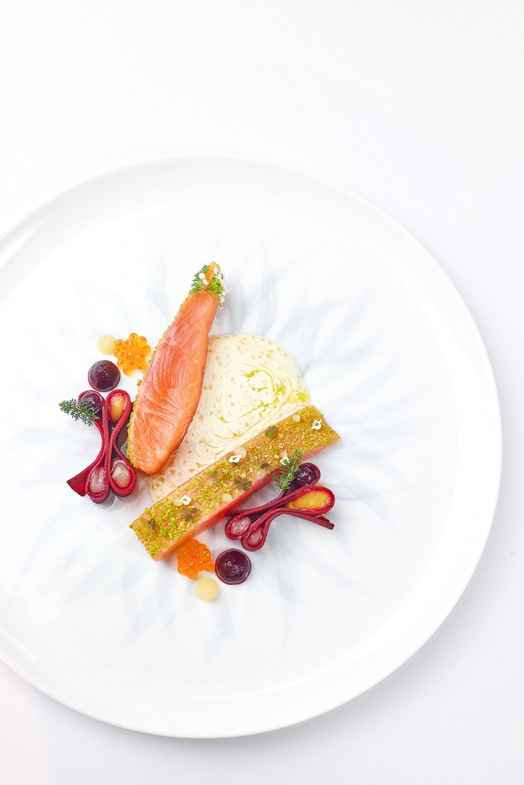 Nishimera trout marinated with licorice and yuzu lactic vinaigrette with kombucha and smoked pine oil. Photo: Cristal Room by Anne-Sophie Pic