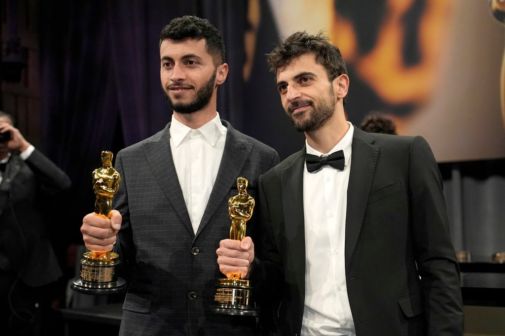 The film’s co-directors, Palestinian activist Basel Adra and Israeli journalist Yuval Abraham. Photo: AP The film’s co-directors, Palestinian activist Basel Adra and Israeli journalist Yuval Abraham. Photo: AP