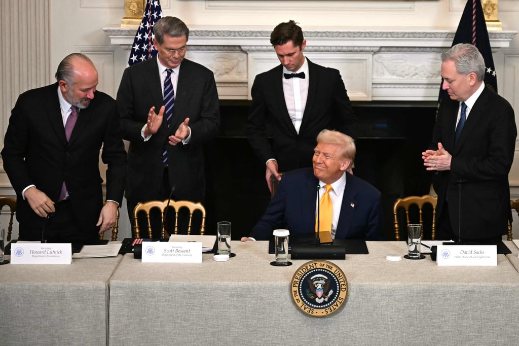 US President Donald Trump, flanked by US Secretary of Commerce Howard Lutnick, US Secretary of Treasury Scott Bessent and White House AI and cryptocurrency tsar David Sacks. Photo: AFP